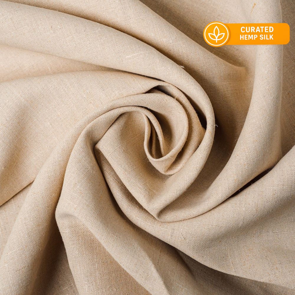 Close-up of beige fabric with &