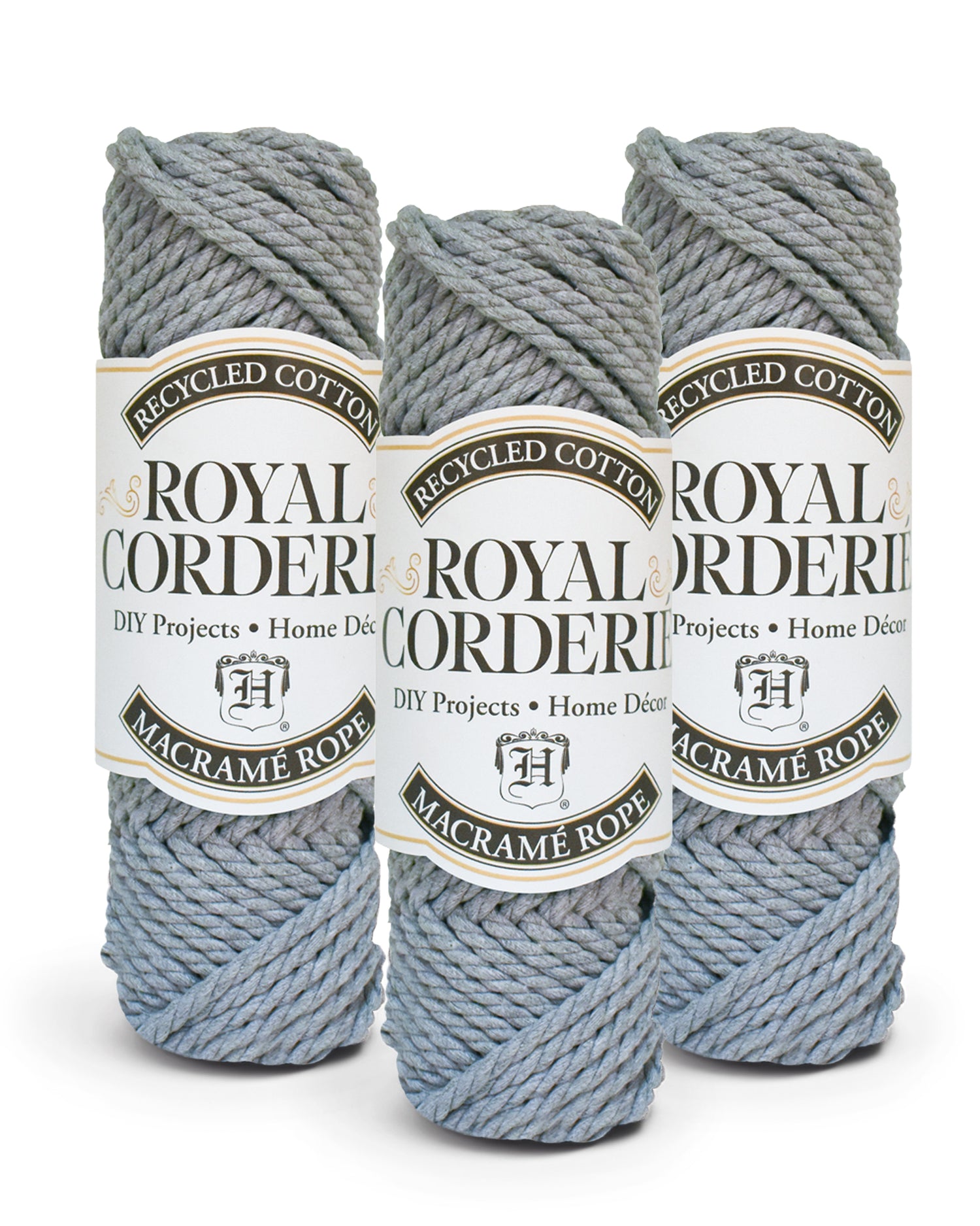 Three skeins of Royal Corderie macramé rope on a white background