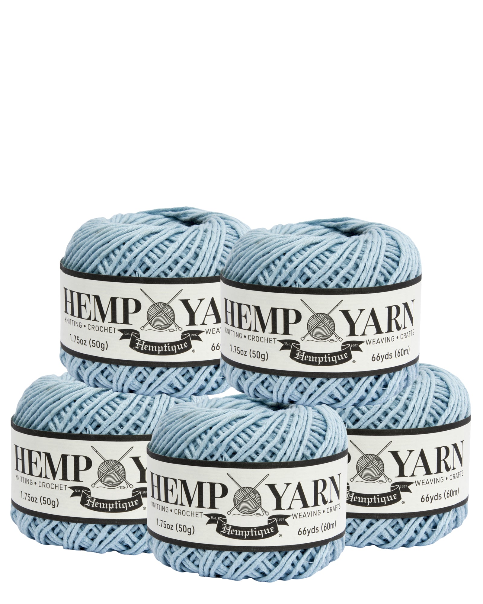 Four balls of blue Hemp Yarn on a white background