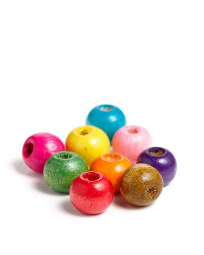 Colorful wooden beads on a white background