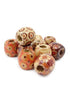 Decorative beads with floral patterns on a white background